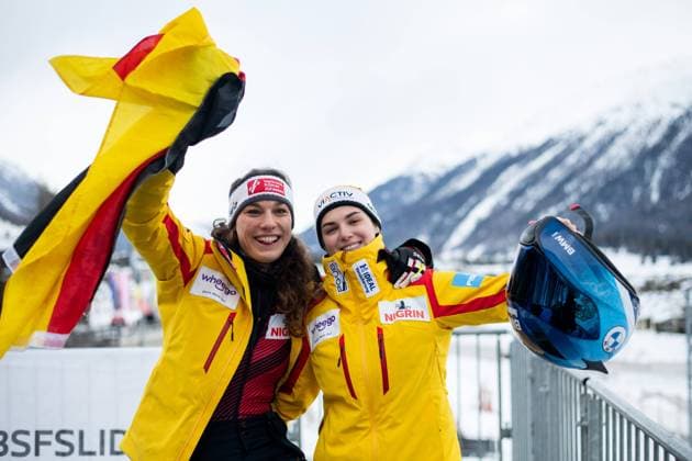 World champion Kim Kalicki, Leonie Fiebig Germany rejoice over victory and world championship title, CH, BMW IBSF two-man bobsleigh world championship, Olympic Bob Run Sankt Moritz, race women, final round, 04 02 2023, season 2022 2023 CH, BMW IBSF two-man bobsleigh world championship, Olympic Bob Run Sankt Moritz, race women, final round, 04 02 2023, season 2022 2023 St Moritz Copyright: xEibner Memmlerx EP_MMR