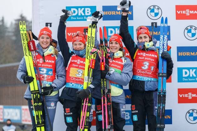 Team Germany, from left Denise Herrmann Wick GER, Germany , Sophia Schneider GER, Germany , Hanna Kebinger GER, Germany , Vanessa Voigt GER, Germany runner-up, silver medal, silver medal cheering, celebration Flower Ceremony, flower ceremony, 2 18 2023, Oberhof Germany , IBU World Championships Biathlon Oberhof 2023 xprx