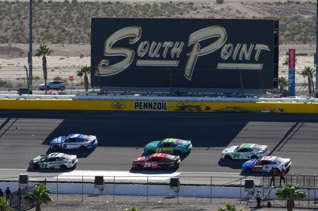 LAS VEGAS, NV - OCTOBER 15: Brad Keselowski ( 6 RFK Racing BuildSubmarines.com Ford), Kyle Larson ( 5 Hendrick Motorsports HendrickCars.com Chevrolet), Christopher Bell ( 20 Joe Gibbs Racing Rheem Smurfit Kappa Toyota), Denny Hamlin ( 11 Joe Gibbs Racing Mavis Tires & Brakes Toyota), William Byron ( 24 Hendrick Motorsports Relay Payments Chevrolet), and Chris Buescher ( 17 RFK Racing Travel Centers of America Ford) drive under the South Point billboard during the NASCAR, Motorsport, USA Cup Series Playoff South Point 400 on October 15, 2023, at the Las Vegas Motor Speedway in Las Vegas, NV. (Photo by Chris Williams Icon Sportswire) AUTO: OCT 15 NASCAR Cup Series Playoff South Point 400 EDITORIAL USE ONLY Icon0072310154321