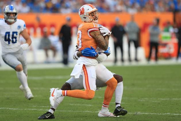 TAMPA, FL - OCTOBER 15: Tampa Bay Buccaneers Wide Receiver Mike Evans (13) fights for yardage after making the catch during the regular season game between the Detroit Lions and the Tampa Bay Buccaneers on October 15, 2023 at Raymond James Stadium in Tampa, Florida. (Photo by Cliff Welch Icon Sportswire) NFL, American Football Herren, USA OCT 15 Lions at Buccaneers EDITORIAL USE ONLY Icon357231015104