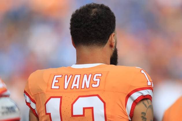 TAMPA, FL - OCTOBER 15: Tampa Bay Buccaneers Wide Receiver Mike Evans (13) listens to the playing of the National Anthem moments before the regular season game between the Detroit Lions and the Tampa Bay Buccaneers on October 15, 2023 at Raymond James Stadium in Tampa, Florida. (Photo by Cliff Welch Icon Sportswire) NFL, American Football Herren, USA OCT 15 Lions at Buccaneers EDITORIAL USE ONLY Icon357231015163