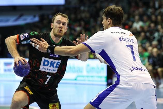 Felix Claar SC Magdeburg,7 vs Julian Köster VfL Gummersbach,7 Handball Bundesliga Season 2023 2024 SC Magdeburg vs VfL Gummersbach at the GETEC Arena in Magdeburg Action,Handball,Germany,03 12 2023