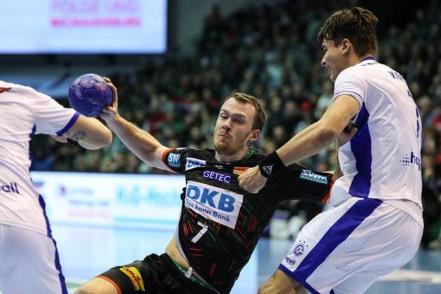 Felix Claar SC Magdeburg,7 vs Julian Köster VfL Gummersbach,7 Handball Bundesliga Season 2023 2024 SC Magdeburg vs VfL Gummersbach at the GETEC Arena in Magdeburg Action,Handball,Germany,03 12 2023