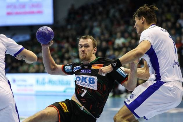 Felix Claar SC Magdeburg,7 vs Julian Köster VfL Gummersbach,7 Handball Bundesliga Season 2023 2024 SC Magdeburg vs VfL Gummersbach at the GETEC Arena in Magdeburg Action,Handball,Germany,03 12 2023