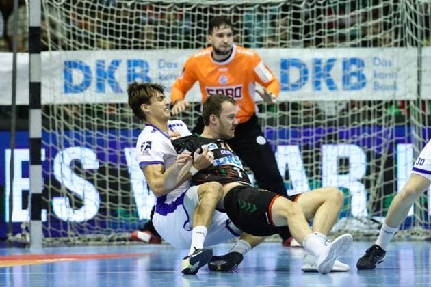 Felix Claar SC Magdeburg,7 vs Julian Köster VfL Gummersbach,7 Handball Bundesliga Season 2023 2024 SC Magdeburg vs VfL Gummersbach at the GETEC Arena in Magdeburg Action,Handball,Germany,03 12 2023