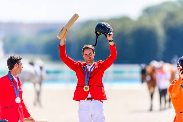 FRA, Olympic Summer Games Paris 2024, Riding, Jumping Individual Final, Award Ceremony Gold for Germany 06 08 2024, Ch teau de Versailles, Paris, FRA, Olympic Summer Games Paris 2024, Riding, Jumping Individual Final, Award Ceremony Gold for Germany , in the picture KUKUK Christian GER on CHECKER 47 wins the gold medal nordphotoxGmbHx xStraubmeier nph00004