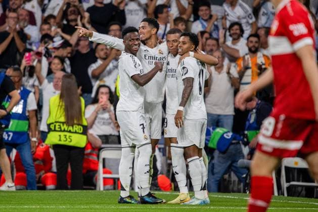 September 17, 2024, Madrid, Spain: From left to right, Vinicius Jr, Jude Bellingham, Kylian MbappÈ and Rodrigo celebrate a goal for their team during the UEFA Champions League group stage match 2024 25 UEFA Champions League group stage match between Real Madrid CF and VfB Stuttgart at Santiago BernabÈu Stadium Real Madrid defeated Stuttgart tonight at the Santiago Bernabeu stadium by 3 goals to 1 in the first match of the 2024-2025 UEFA Champions League. Madrid Spain - ZUMAs197 20240917_aaa_s197_269 Copyright: xDavidxCanalesx