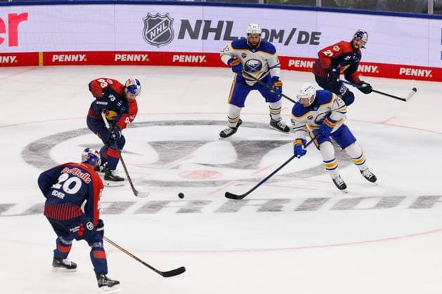 in duel, action, with Maximilian Kastner 93 EHC Red Bull Muenchen , Connor Clifton 75 Buffalo Sabres , Red Bull Muenchen vs Buffalo Sabres, Grand Opening SAP Garden, Ice Hockey, 27 09 2024 Muenchen Bayern Germany Copyright: xkolbert-press ChristianxKolbertx