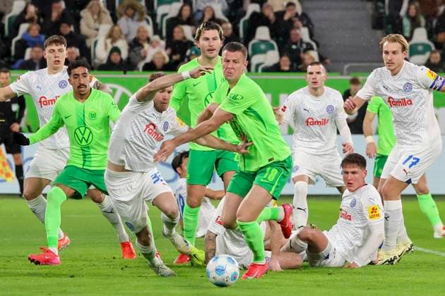 Dominik Javorcek Holstein Kiel and Denis Vavro VfL Wolfsburg battle for the ball, Bundesliga, VfL Wolfsburg v Holstein Kiel, Volkswagen Arena, January 24, 2025 in Wolfsburg, Germany Photo by Marco Steinbrenner DeFodi Images Dominik Javorcek Holstein Kiel and Denis Vavro VfL Wolfsburg battle for the ball, Bundesliga, VfL Wolfsburg v Holstein Kiel, Volkswagen Arena, January 24, 2025 in Wolfsburg, Germany Photo by Marco Steinbrenner DeFodi Images DFL regulations prohibit any use of photographs as image sequences and or quasi video Defodi 700 wolf kiel 20250124 042 Defodi-700 DFL regulations prohibit any use of photographs as image sequences and or quasi-video.