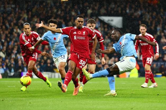 Jeremy Doku of Manchester City shoots at goal Manchester City v Liverpool, Premier League, Football, Etihad Stadium, Manchester, UK - 09 Nov 2025Manchester Etihad Stadium United Kingdom EDITORIAL USE ONLY No use with unauthorised audio, video, data, fixture lists, club league logos or live services. Online in-match use limited to 120 images, no video emulation. No use in betting, games or single club league player publications. Copyright: xPaulxCurrie Shutterstockx 15702266ex