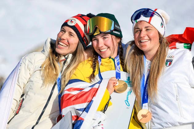 OLYMPICS - Winter Olympic Games, Olympische Spiele, Olympia, OS Milano Cortina 2026 LIVIGNO,ITALY,13.FEB.26 - OLYMPICS, SNOWBOARD - Winter Olympic Games Milano Cortina 2026, Snowboard Cross, women, final, medal ceremony. Image shows the rejoicing of Eva Adamczykova (CZE), Josie Baff (AUS) and Michela Moioli (ITA). Keywords: medal. GEPAxpictures xWolfgangxGrebien