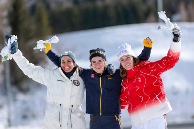 OLYMPICS - Winter Olympic Games, Olympische Spiele, Olympia, OS Milano Cortina 2026 TESERO,ITALY,22.FEB.26 - OLYMPICS, NORDIC SKIING, CROSS COUNTRY SKIING - Winter Olympic Games Milano Cortina 2026, 50km mass start, classic, women, medal ceremony. Image shows the rejoicing of Heidi Weng (NOR), Ebba Andersson (SWE) and Nadja Kaelin (SUI). GEPAxpictures xMatthiasxTrinkl