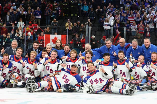March 15, 2026, Milan, Lombardy, Italy: Team USA players of whom hat-trick goal scorer JACK WALLACE, tournament Mvp DECLAN FARMER, captain JOSH PAULS, goalie GRIFFIN LAMARRE and coach DAVID HOFF celebrate with their gold medals after the Final game between Team United States (USA) and Team Canada (CAN) at the Milano Cortina 2026 Paralympic Winter games, Winterspiele,Spiele, Summer games Team USA won 6:2 and their fifth consecutive Para Ice hockey, Eishockey Paralympics 2026: Milano Cortina: USA Make It Five-In-A-Row In Sled Hockey - ZUMAc179 20260315_oly_c179_130 Copyright: xMickaelxChavetx