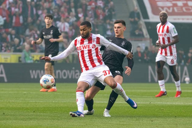 Duel between Linton Maina 1 FC Koeln, 37 and Yannik Engelhardt Borussia Moenchengladbach, 06 1 FC Koeln vs Borussia Moenchengladbach, Football, 1 Bundesliga, Matchday 27, Season 2025 2026, 21 03 2026 DFL DFB Regulations prohibit any use of Photographs as image sequences and or Quasivideo 1 FC Koeln vs Borussia Moenchengladbach, Football, 1 Bundesliga, Matchday 27, Season 2025 2026, 21 03 2026 Koeln Copyright: xEibner-Pressefoto ThomasxHaeslerx EP_THR