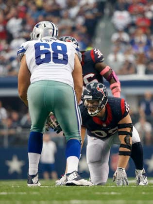 October 05, 2014: Houston Texans defensive end J.J. Watt (99) and Dallas Cowboys tackle Doug Free (68) during the NFL, American Football Herren, USA game between the Houston Texans and the Dallas Cowboys at AT&T Stadium in Arlington, TX. The Cowboys defeated the Texans 20-17 in overtime. Copyright: xTimxWarnerx