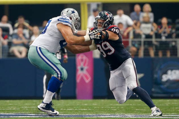 October 05, 2014: Houston Texans defensive end J.J. Watt (99) and Dallas Cowboys tackle Doug Free (68) during the NFL, American Football Herren, USA game between the Houston Texans and the Dallas Cowboys at AT&T Stadium in Arlington, TX. The Cowboys defeated the Texans 20-17 in overtime. Copyright: xTimxWarnerx