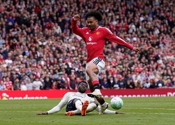 Manchester, England, 17th May 2026. Joshua Zirkzee of Manchester United, ManU tackled by Ibrahim Sangare of Nottingham Forest during the Manchester United vs Nottingham Forest Premier League match at Old Trafford, Manchester. Picture credit should read: Andrew Yates Sportimage EDITORIAL USE ONLY. No use with unauthorised audio, video, data, fixture lists, club league logos or live services. Online in-match use limited to 120 images, no video emulation. No use in betting, games or single club league player publications. SPI_110_AY_Man_Utd_Forest SPI-4806-0102