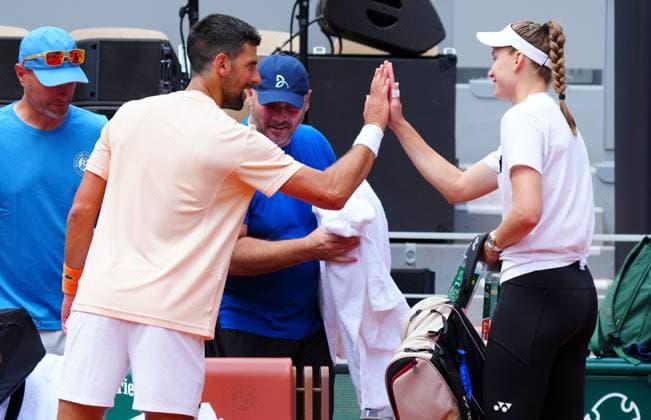 Novak Djokovic and Elena Rybakina high five between practice sessions French Open Tennis, Thursday Previews, Qualifying and Practice, Tennis, Roland Garros, Paris, France - 21 May 2026Paris Roland Garros France EDITORIAL USE ONLY No use with unauthorised audio, video, data, fixture lists, club league logos or live services. Online in-match use limited to 120 images, no video emulation. No use in betting, games or single club league player publications. Copyright: xJavierxGarcia Shutterstockx 16886896t