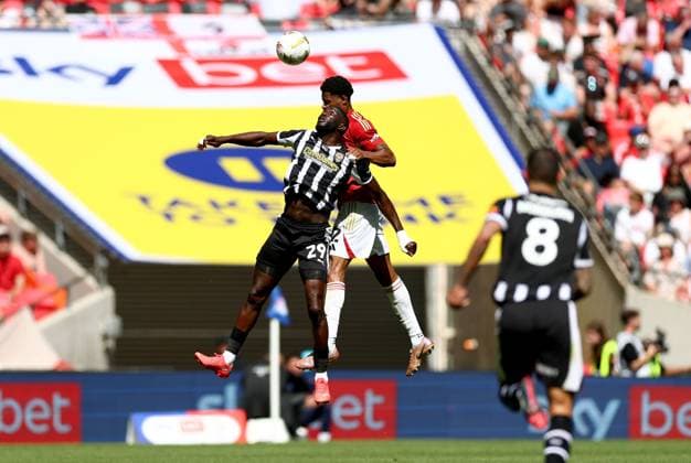 Alassana Jatta of Notts County in action against Adebola Oluwo of Salford City Notts County v Salford City, EFL Sky Bet League Two, Play-Off Final, Football, Wembley Stadium, London, UK - 25 May 2026London Wembley Stadium United Kingdom EDITORIAL USE ONLY No use with unauthorised audio, video, data, fixture lists, club league logos or live services. Online in-match use limited to 120 images, no video emulation. No use in betting, games or single club league player publications. Copyright: xSimonxDael Shutterstockx 16889935cc
