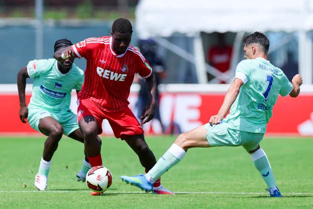 Boris Mamuzah Lum of Hertha BSC Berlin, Ragnar Prince Friedel Ache of 1. FC Köln, and Josip Brekalo of Hertha BSC Berlin battle for the ball, Friendly match, 1 FC Köln vs. Hertha BSC Berlin, Koasastadion on July 31, 2026, in St. Johann in Tirol, Austria. Photo by Marco Steinbrenner, DeFodi Images. Boris Mamuzah Lum of Hertha BSC Berlin, Ragnar Prince Friedel Ache of 1 FC Köln and Josip Brekalo of Hertha BSC Berlin battle for the ball, Friendly match, 1 FC Köln vs. Hertha BSC Berlin, Koasastadion, July 31, 2026, in St. Johann in Tirol, Austria. Photo by Marco Steinbrenner, DeFodi Images