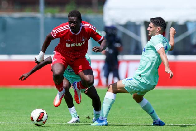 Ragnar Prince Friedel Ache of 1. FC Köln and Josip Brekalo of Hertha BSC Berlin battle for the ball, Friendly match, 1. FC Köln vs. Hertha BSC Berlin, Koasastadion on July 31, 2026, in St. Johann in Tirol, Austria. Photo by Marco Steinbrenner, DeFodi Images. Ragnar Prince Friedel Ache of 1. FC Köln and Josip Brekalo of Hertha BSC Berlin battle for the ball, Friendly match, 1 FC Köln vs. Hertha BSC Berlin, Koasastadion, July 31, 2026, in St. Johann in Tirol, Austria. Photo by Marco Steinbrenner, DeFodi Images