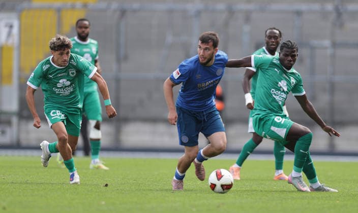From left: Quentin Benaets (La Louvière), Mehmet Aydin (Eintracht Braunschweig), Nachon Nsingi (La Louvière) — Soccer, Men s, 2026–2027 Season, 2nd Division, Eintracht Stadium, Eintracht Braunschweig vs. RAAL La Louvière, preseason, friendly match, 0–0. DFL regulations prohibit any use of photographs as image sequences and or quasi-video.