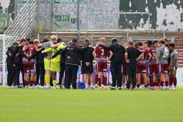 August 26, 2026, GER, Regionalliga Nord, Soccer, Matchday 1, 2026–2027 Season, Dietmar Scholze Stadium at the Lohmühle, VfB Lübeck vs. SC Weiche Flensburg, Final Score 1–1, SC Weiche Flensburg 08 celebration circle, Photo: nordphoto GmbH, Tauchnitz, Lübeck, Dietmar Scholze Stadium at the Lohmühle, SH, Germany Copyright: xnordphotoxGmbHx xTauchnitzx