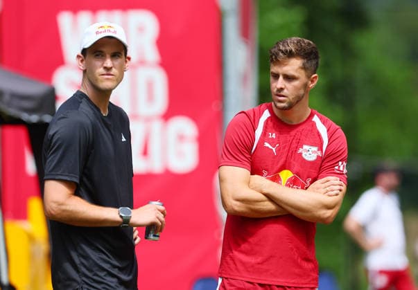 RB Leipzig (AUT) Training Camp, Bundesliga, Saalfelden, August 6, 2026, Gut Brandlhof, Soccer, Bundesliga, GER, RB Leipzig training camp in Saalfelden am Steinernen Meer, AUT. Pictured from left: Dominic Thiem, Austrian professional tennis player, and Christoph Baumgartner, Austrian RB Leipzig player, Picture Point