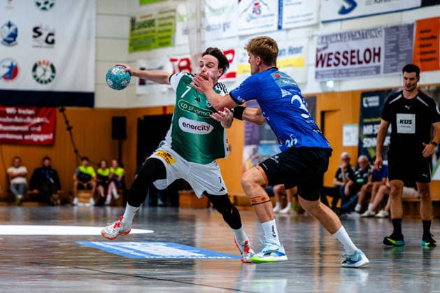 August 7, 2026, xdobgx, 2026 Heide Cup Handball Tournament, TSV Hannover Burgdorf vs. Mors Thy Handball, from left: Leif Tissier (TSV Hannover Burgdorf), 7 on the ball, plays the ball, one-on-one, duel, battle, tackle, Silas Overby (Mors Thy Handball), 36