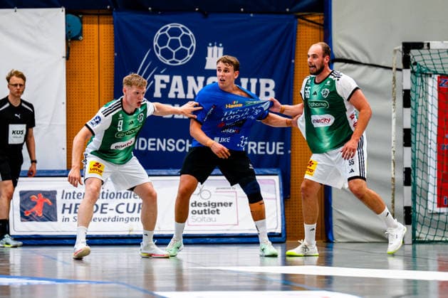 August 7, 2026, xdobgx, 2026 Heide Cup Handball Tournament, TSV Hannover Burgdorf vs. Mors Thy Handball: Vilhelm Poulsen (TSV Hannover Burgdorf), 9; Kasper Didriksen (Mors Thy Handball), 33; Tim Zechel (TSV Hannover Burgdorf), 55; one-on-one, duel, battle, tackle