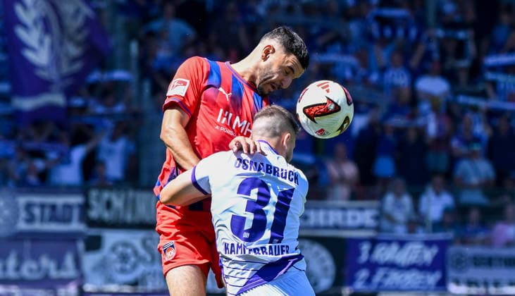 August 8, 2026, xemx, Soccer 2. Bundesliga, 1. FC Heidenheim vs. VfL Osnabrück, L. Oualid Mhamdi, 1. FC Heidenheim, Patrick Kammerbauer, VfL Osnabrück, tackle, action, battle for the ball. DFL and DFB regulations prohibit any use of photographs as image sequences and or quasi-video. Heidenheim