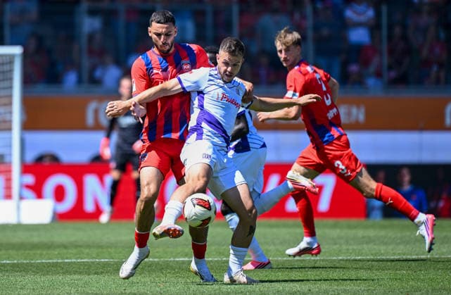 August 8, 2026, xemx, Soccer 2. Bundesliga, 1. FC Heidenheim vs. VfL Osnabrück, L. Oualid Mhamdi, 1. FC Heidenheim, Patrick Kammerbauer, VfL Osnabrück, tackle, action, battle for the ball. DFL and DFB regulations prohibit any use of photographs as image sequences and or quasi-video. Heidenheim