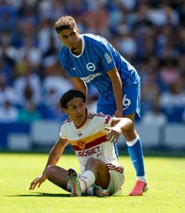 Paulo Dybala of AS Roma (on ground) and Yasin Ayari of Brighton and Hove Albion Brighton and Hove Albion v Roma, Pre Season Friendly, Football, American Express Community Stadium, Brighton, UK - 08 Aug 2026Brighton American Express Community Stadi United Kingdom EDITORIAL USE ONLY No use with unauthorised audio, video, data, fixture lists, club league logos or live services. Online in-match use limited to 120 images, no video emulation. No use in betting, games or single club league player publications. Copyright: xMattxImpey Shutterstockx 17050873g