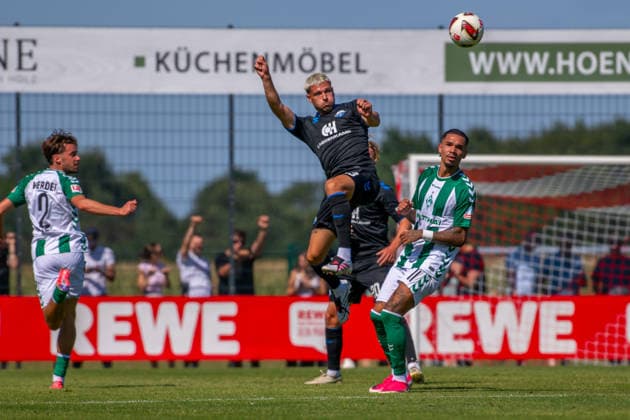 Friendly Match: Werder Bremen vs. SC Paderborn 07, August 8, 2026; Raphael Obermair, SC Paderborn 07, 23, Justin Njinmah, Werder Bremen, 11 Friendly match: Werder Bremen vs. SC Paderborn 07 on August 8, 2026, at Oyther Berg Stadium in Vechta, Germany, Copyright: xBEAUTIFULxSPORTS Neddermannx
