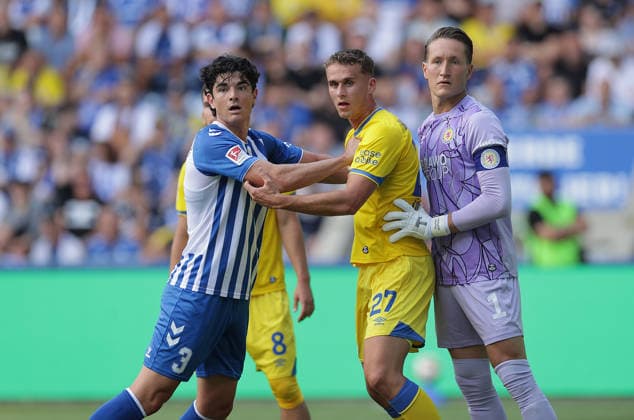 Anselmo Garcia Mac Nulty, 1. FC Magdeburg; Jan Urbich, Eintracht Braunschweig; Goalkeeper Ron Thorben Hoffmann, Eintracht Braunschweig; Soccer, Men s, 2026–2027 Season, 2. Bundesliga, Avnet Arena, Matchday 1, 1 FC Magdeburg vs. Eintracht Braunschweig, 1–6. DFL regulations prohibit any use of photographs as image sequences and or quasi-video.