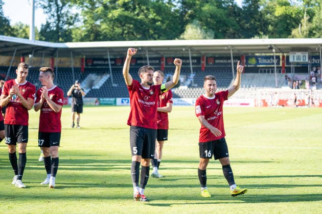 Volkan Celiktas of SG Sonnenhof Großaspach, 05, and Marius Kunde of SG Sonnenhof Großaspach, 16, celebrate the victory with the fans; SG Sonnenhof Großaspach vs. Fortuna Köln, soccer, 3rd Division, Matchday 1, August 8, 2026, DFB regulations prohibit any use of photographs as image sequences and or quasi-video. Aspach, Baden-Württemberg, Germany Copyright: xkolbert-press PhilipxZieglerx