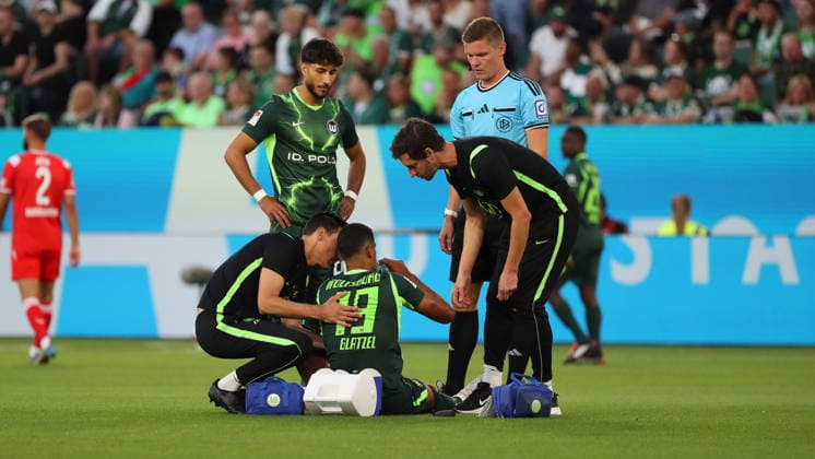 VfL vs. 1 FCK, 2nd Bundesliga Wolfsburg, August 8, 2026, Soccer, Men s, 2nd Bundesliga, 2026–2027 Season, VfL Wolfsburg vs. 1 FC Kaiserslautern: Robert Glatzel of VfL Wolfsburg is injured and requires medical attention. DFL and DFB regulations prohibit any use of photographs as image sequences and or quasi-video. Volkswagen Arena, Lower Saxony, Germany