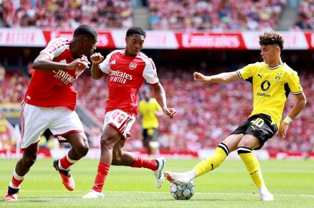 Samuele Inacio of Borussia Dortmund in action against Cristhian Mosquera of Arsenal Arsenal v Borussia Dortmund, Pre Season Friendly, Football, Emirates Stadium, London, UK - 09 Aug 2026London Emirates Stadium United Kingdom EDITORIAL USE ONLY No use with unauthorised audio, video, data, fixture lists, club league logos or live services. Online in-match use limited to 120 images, no video emulation. No use in betting, games or single club league player publications. Copyright: xGeorgexTewkesbury Shutterstockx 17051143am