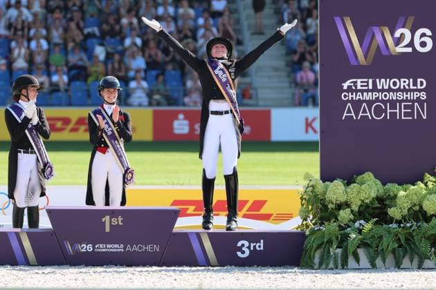 Cheers, excitement, victory celebrations, excitement, 3rd place and bronze for Katharina Hemmer GER, Germany, with horse Denoix PCH; other placings; award ceremony: 1st place Charlotte Fry GBR, Great Britain, United Kingdom, with horse Glamourdale, 2nd place: Cathrine Laudrup Dufour (DEN), Denmark, on Mount St John Freestyle; 3rd place, bronze: Katharina Hemmer (GER), Germany, Denoix PCH, Dressage, FEI Dressage World Championship MEGGLE Prize, Grand Prix Special, Individual Competition, AACHEN FEI World Championships 2026, World Festival of Equestrian Sports, 2026 Equestrian World Championships, Aachen 2026, Welcome Home 2026, Aachen Soers, August 11–23, 2026, Equestrian Sports, August 14, 2026, Aachen Soers, Germany