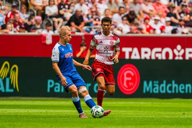 Valentin Laessig (TSG Hoffenheim II, No. 06) plays a pass to Jordi Paulina (Fortuna Düsseldorf, No. 27). Fortuna Düsseldorf vs. TSG Hoffenheim II, soccer, 3. Liga, Matchday 2, 2026–27 season, August 15, 2026, DFL regulations prohibit any use of photographs as image sequences and or quasi-video, Fortuna Düsseldorf vs. TSG Hoffenheim II, soccer, 3. Liga, Matchday 2, 2026–27 Season, August 15, 2026, Düsseldorf Copyright: xEibner-Pressefoto LukasxBaldygax EP_LBA