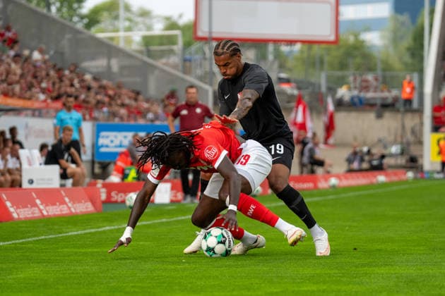 Tackle between Franci Bouebari of Rot Weiss Essen, 19, and Eric Voufack of TSV Havelse, 19, GER Rot Weiss Essen vs. TSV Havelse, Soccer, 3rd Division, Matchday 02, 2026–2027 Season, August 15, 2026 DFB and DFL regulations prohibit any use of photographs as image sequences and or quasi-video, GER Rot Weiss Essen vs. TSV Havelse, soccer, 3rd League, Matchday 02, 2026–2027 season, August 15, 2026, Essen Copyright: xEibner-Pressefoto FabianxFriesex EP_FFE