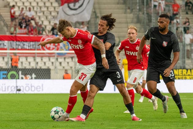 Jannik Hofmann, Rot Weiss Essen, 37, vs. Max Lamby, TSV Havelse, 03, GER Rot Weiss Essen vs. TSV Havelse, Soccer, 3rd Division, Matchday 02, 2026–2027 Season, August 15, 2026 DFB and DFL regulations prohibit any use of photographs as image sequences and or quasi-video, GER Rot Weiss Essen vs. TSV Havelse, soccer, 3rd Division, Matchday 02, 2026–2027 season, August 15, 2026, Essen Copyright: xEibner-Pressefoto FabianxFriesex EP_FFE