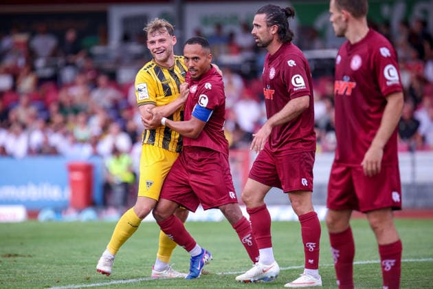 August 15, 2026, xsefx, Soccer, SC Fortuna Köln vs. TSV Alemannia Aachen, 3. Liga, Südstation, Matchday 2, 2026–2027 Season Robin Afamefuna, Fortuna Cologne, 22, scuffle and shoving with Mika Schroers, Alemannia Aachen, 27. DFB regulations prohibit any use of photographs as image sequences and or quasi-video. North Rhine-Westphalia, Germany