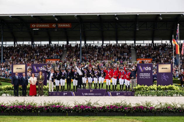 260816 Team Germany: Malin Hansen Hotopp, Julia Krajewski, Libussa Lubbecke, and Michael Jung; Team Great Britain: Laura Collett, Tom McEwen, Rosalind Canter, and Caroline Harris; and Team USA—Phillip Dutton, Boyd Martin, William Coleman, and Tamra Smith—celebrate on the podium after the Eventing Show Jumping Final on day 6 of the 2026 FEI World Championships on August 16, 2026 in Aachen. Photo by Emma Wallskog. BILDBYRAN code EW EW0687 equestrian sports 2026 World Championships 2026 FEI World Championships BBENG equestrian sports World Championships eventing Copyright: EMMAxWALLSKOG BB260816EW060