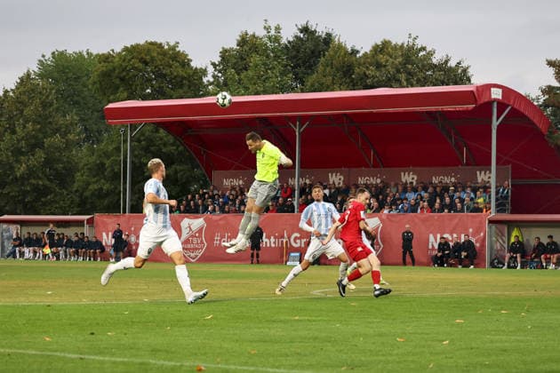August 18, 2026, Men s Soccer, 2026–2027 Season, Bavarian Regional League, Matchday 5: TSV Aubstadt vs. TSV 1860 Munich, Vitus Eicher 30, TSV 1860 Munich clears the ball past Joshua Endres 33, TSV Aubstadt Sulzfeld, Schulstadion Aubstadt, NGN Arena, Bavaria, Germany