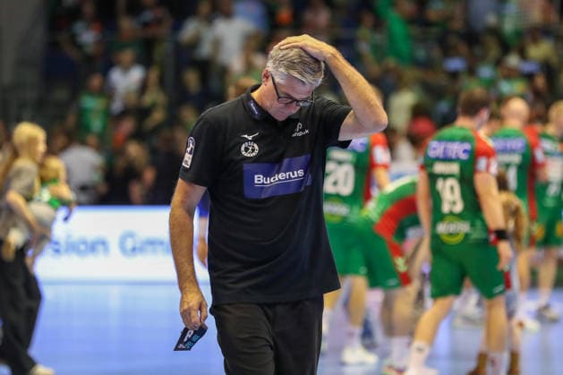 September 13, 2026, xgox, Handball Opel HBL SC Magdeburg vs. HSG Wetzlar, from left: Runar Sigtryggsson (Wetzlar), coach looks disappointed, looks dejected, looks downcast, looks disappointed (Magdeburg)