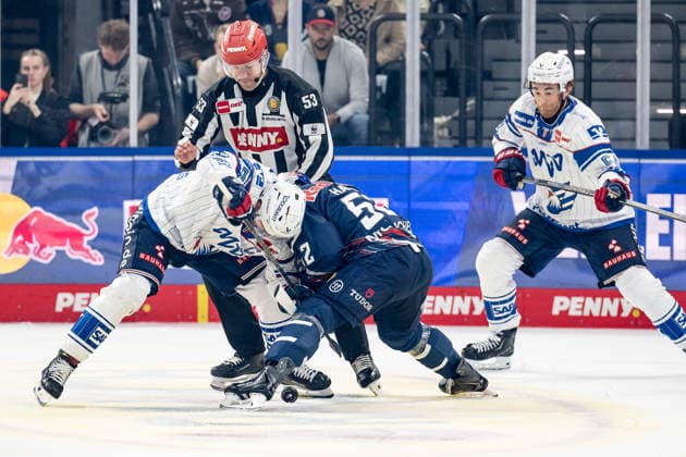Linesman Joshua Roemer officiates a faceoff between Marc Michaelis of Adler Mannheim, 65, and Patrick Hager of EHC Red Bull Munich, 52 (GER), EHC Red Bull Munich vs. Adler Mannheim, ice hockey, DEL, 2026–2027 season, Matchday 1, September 18, 2026. Photo by HMB Media, Heike Feiner Copyright: HMBxMedia HeikexFeiner