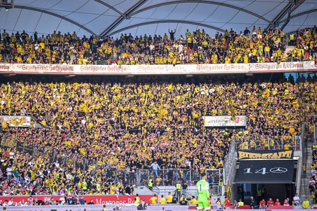 BVB Dortmund fans during the Bundesliga match between VfB Stuttgart and Borussia Dortmund, at the MHPArena on September 19, 2026, in Stuttgart, Germany. Photo by Harry Langer, DeFodi Images. BVB Dortmund supporters during the Bundesliga match between VfB Stuttgart and Borussia Dortmund at the MHPArena on September 19, 2026, in Stuttgart, Germany. Photo by Harry Langer, DeFodi Images. DFB and DFL regulations prohibit any use of photographs as image sequences and or quasi-video. Photo by Harry Langer, DeFodi Images. DFB and DFL regulations prohibit any use of photographs as imageSEQUENCES AND OR QUASI-VIDEO