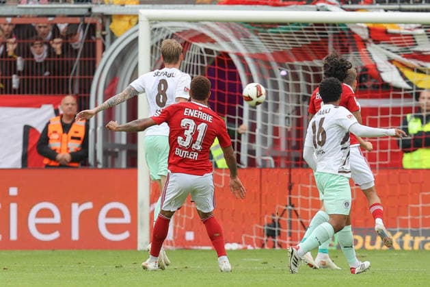 September 20, 2026, xtgx, Soccer 2. Bundesliga, FC Energie Cottbus vs. FC St. Pauli, from left: Justin Butler (Cottbus), 31, scores a goal, shoots, goal scorer, scores, goal, scores the goal 1–0 DFL DFB REGULATIONS PROHIBIT ANY USE OF PHOTOGRAPHS as IMAGE SEQUENCES and or QUASI-VIDEO Cottbus