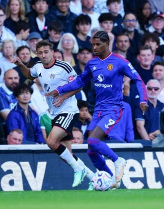 Timothy Castagne of Fulham and Marcus Rashford of Manchester United, ManU Fulham v Manchester United, Premier League, Football, Craven Cottage, London, UK - 20 Sep 2026London Craven Cottage United Kingdom EDITORIAL USE ONLY No use with unauthorised audio, video, data, fixture lists, club league logos or live services. Online in-match use limited to 120 images, no video emulation. No use in betting, games or single club league player publications. Copyright: xJavierxGarcia Shutterstockx 17160117ad